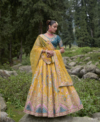 ELEGANT MUSTERED YELLOW CIRCULAR LEHENGA SET IN GUDWAL SELF PURE VISCOS WITH SILK BLOUSE AND RAMA NET DUPATTA