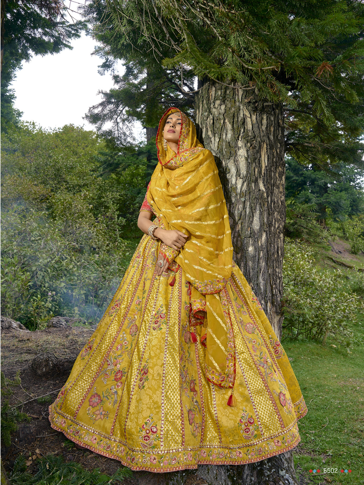 MAJESTIC MUSTERED CIRCULAR LEHENGA SET IN PURE VISCOS WITH ORGANZA BLOUSE AND DUPATTA