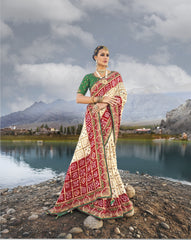 Cream Pure Gajji Bandhej Satin silk saree with heavy Original, Mirror, Moti & Cut Dana work