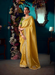 Mustard Yellow color Pure Banarasi Kanjivaram fabric saree with heavy work border saree