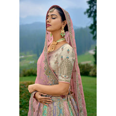 VIBRANT MULTI-COLOURED CIRCULAR LEHENGA SET IN ORGANZA WITH OFF-WHITE TISSUE JARI GOTTA PATI BLOUSE AND PEACH DUPATTA