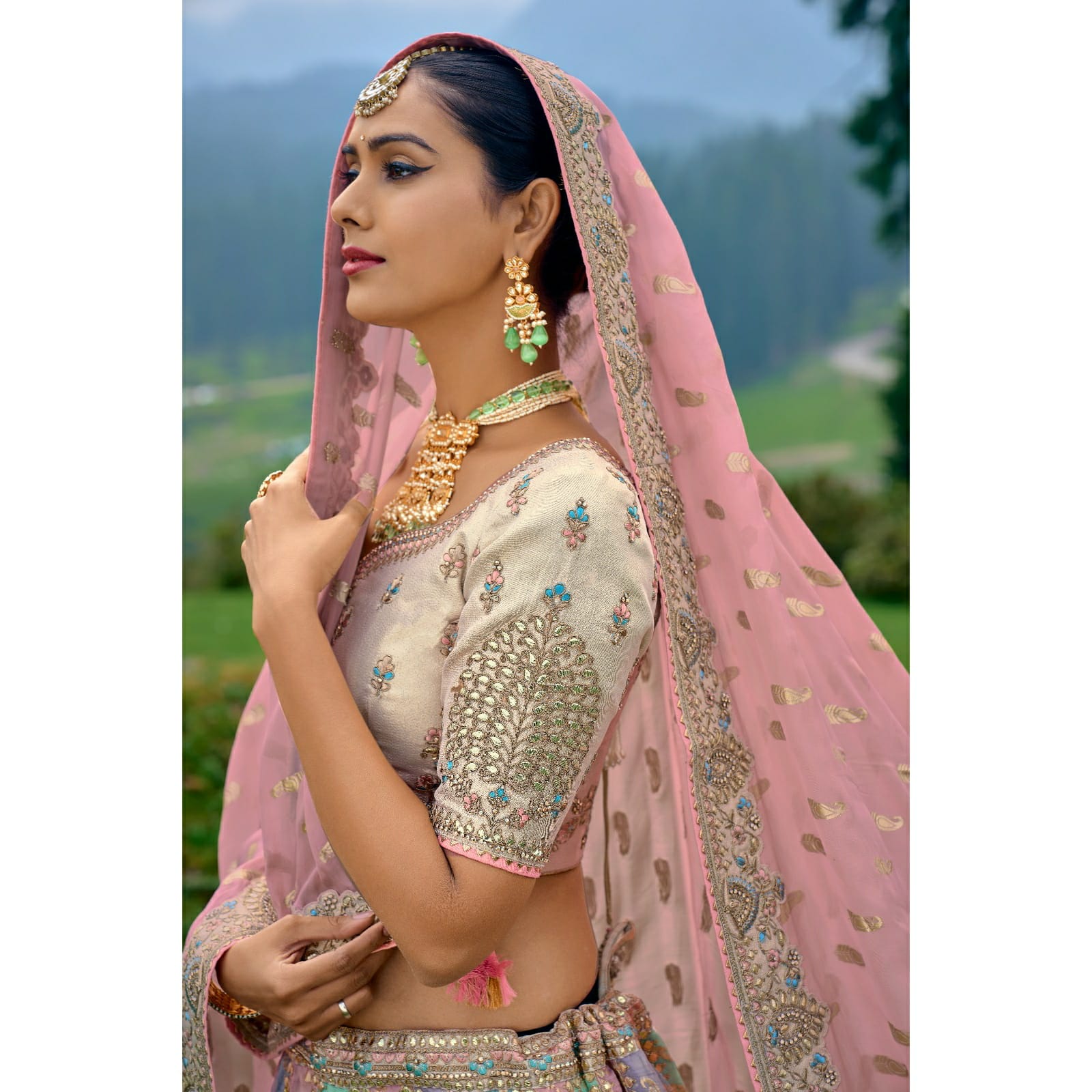 VIBRANT MULTI-COLOURED CIRCULAR LEHENGA SET IN ORGANZA WITH OFF-WHITE TISSUE JARI GOTTA PATI BLOUSE AND PEACH DUPATTA