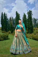 OPULENT GOLD CIRCULAR LEHENGA SET IN PURE KANJIVARAM WITH FIROZI BLOUSE AND DUPATTA