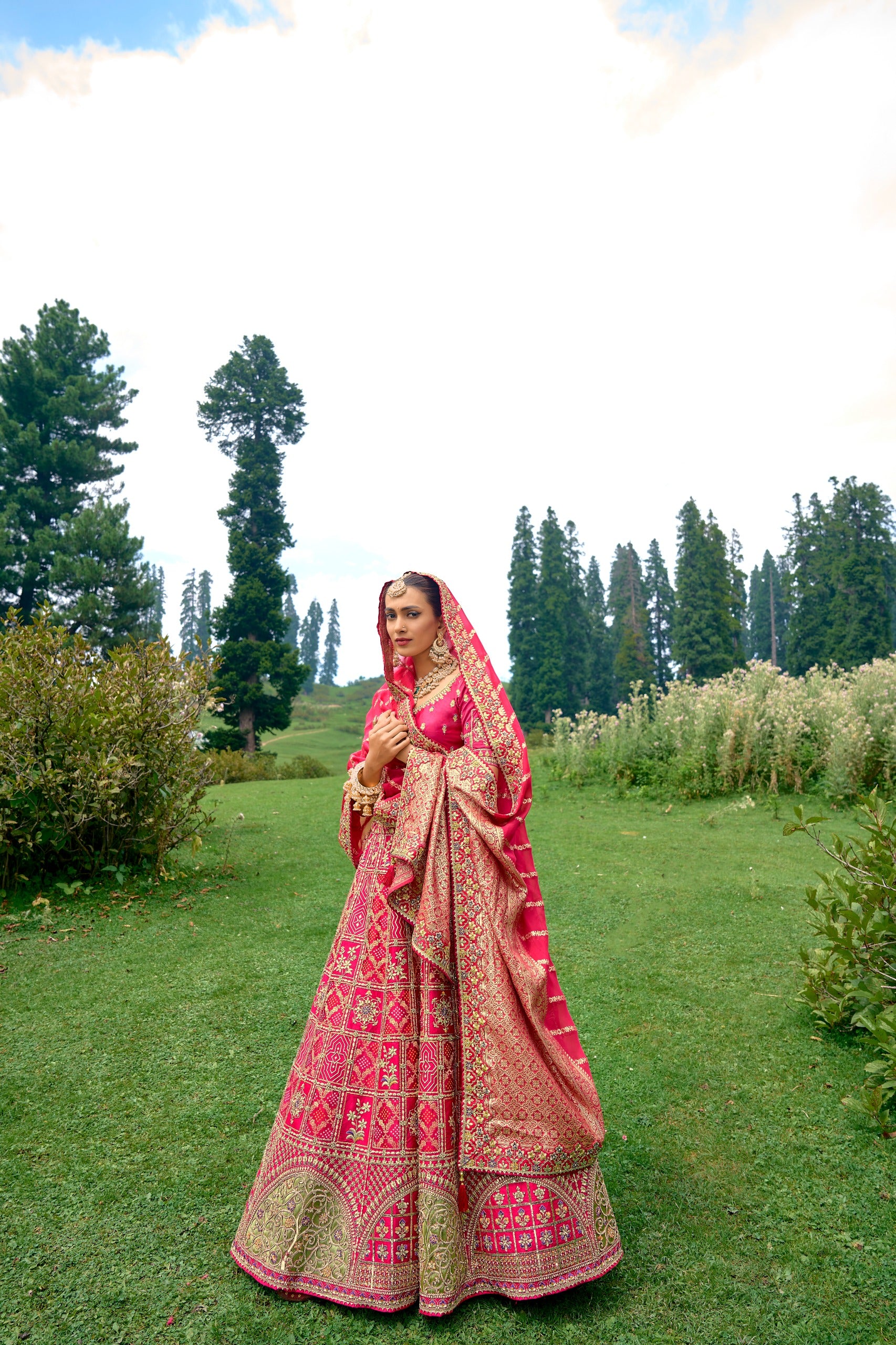 RADIANT PINK CIRCULAR LEHENGA SET IN PURE BANDHEJ WITH MATCHING BLOUSE AND DUPATTA