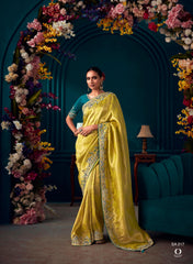 Yellow color Pure Banarasi Kanjivaram fabric saree with heavy work border saree